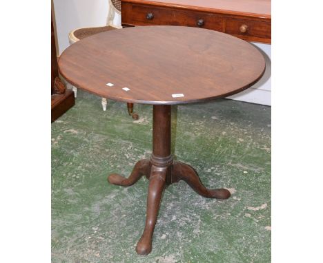 A George III oak tripod tilt-top table, circular top, canon barrel column, cabriole legs, pad feet, circa 1800. 72.5cm high x