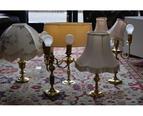 Lighting - a pair of brass columnar three branch table lamps; others similar (5)