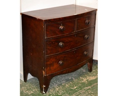 A Victorian mahogany caddy topped bow front chest, two short drawers over two long, turned handles, bracket feet. 89cm high x