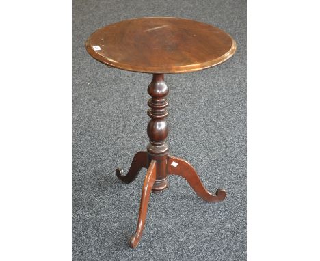 A Victorian mahogany tripod occasional table, moulded circular tilting-top, baluster column, cabriole legs, 71cm high, 52cm d