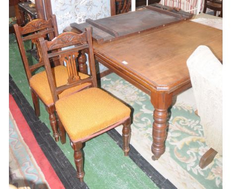 A late Victorian/Edwardian mahogany wind out dining table canted rectangular top, turned legs, ceramic casters, circa 1900 (o