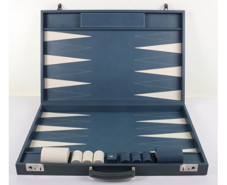 A large and superb quality Asprey blue leather backgammon set, size when closed 64cmx41.5cm, signed locks and keys, checkers 