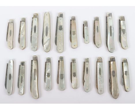Twenty early 20th century silver and mother of pearl folding fruit knives, the blades hallmarked, including John Yeomans Cowl
