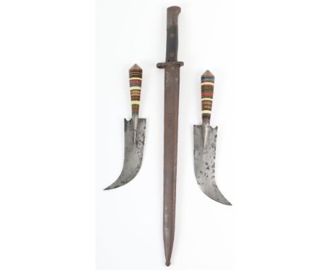 A British 1907 pattern sword bayonet and scabbard, with two Eastern daggers, (3)