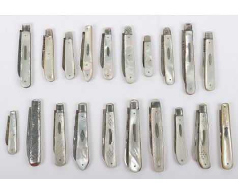 Twenty early 20th century silver and mother of pearl folding fruit knives, one with silver handle, blades hallmarked, includi
