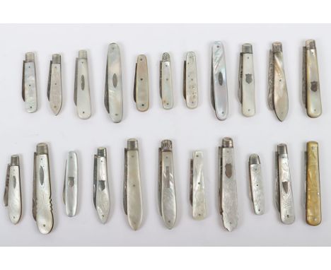 Twenty one early 20th century silver and mother of pearl folding fruit knives, with one horn handle, hallmarked blades, inclu