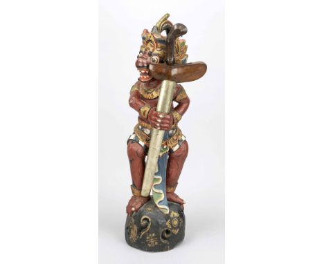 Kris mit figürlichem Stand, Indonesien 20. Jh., Holz polychrom staffiert. Scheide mit Metallummantelung, ber. und leicht best