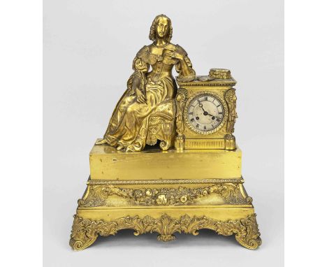 Empire Bronze Figurenpendule, 1.H.19.Jh., eine Dame Liebesbrief schreibend, reich verziert mit Blattwerk und Früchten, versil