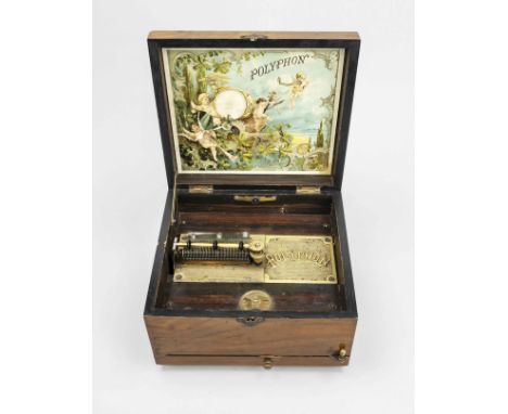 Polyphon, Deutschland um 1900. Holzkorpus mit Scharnierdeckel, Tonkamm mit Fehlstelle, Mechanismus funktioniert, Gebrauchsspu