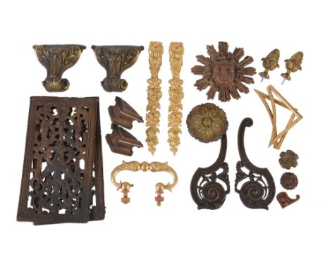  A quantity of clock case mounts Anomynous, 18th century and later  Including pair of table clock scroll and floral pendant c