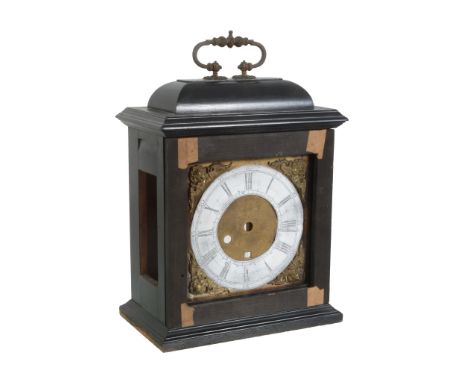  A William III style ebony veneered table clock case Attributed to Michael Hurst, recent  With hinged tied foliate bud cast b