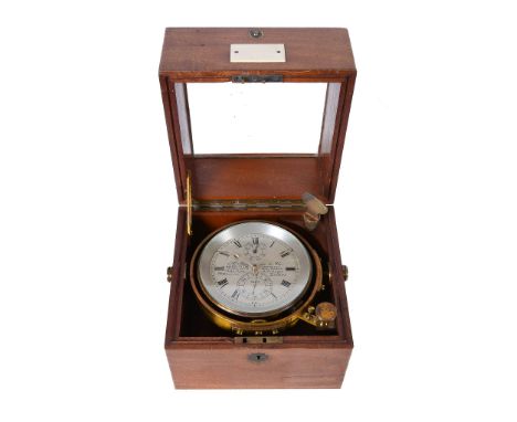 Ω A mahogany cased two-day marine chronometer A. Johannsen and Company, London, early 20th century The circular four pillar s