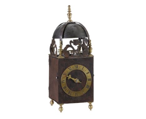  An unusual iron-framed lantern clock Unsigned, first half of the 17th century and later  The posted countwheel bell-striking