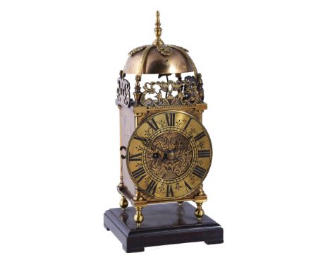  A Victorian lacquered brass miniature lantern clock with passing strike Unsigned, circa 1880  The rectangular four pillar si