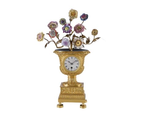  A fine French Empire small ormolu vase timepiece Unsigned, early 19th century  The circular single train movement with ancho