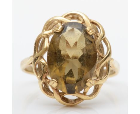 A 9ct gold smokey quartz dress ring, stone 14 x 9mm, P 1/2, 3.3gm 