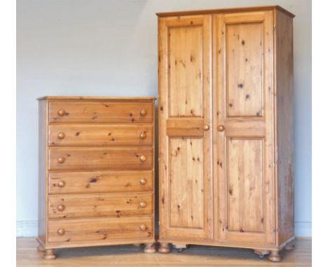 A Ducal stained pine chest of drawers, six equally sized drawers with bun handles, on bun feet, 88 x 120 x 42cm, together wit