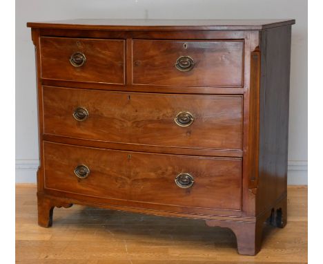 A late 19th century bow fronted mahogany chest of drawers, two small lockable drawers over two long lockable drawers, 104 x 9