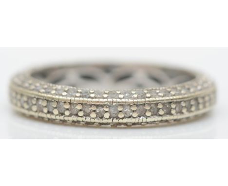 A 9ct white gold and brilliant cut diamond three row full eternity ring, stated weight 0.75cts, 2.6gm, M. 