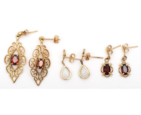 A 9ct gold pair of opal ear rings and two garnet set pairs, 4.2gm 