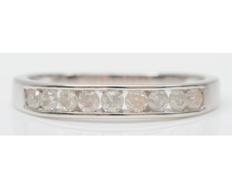 A 9ct white gold and brilliant cut diamond channel set ring, approximately 0.45cts, S, 2.3gm 