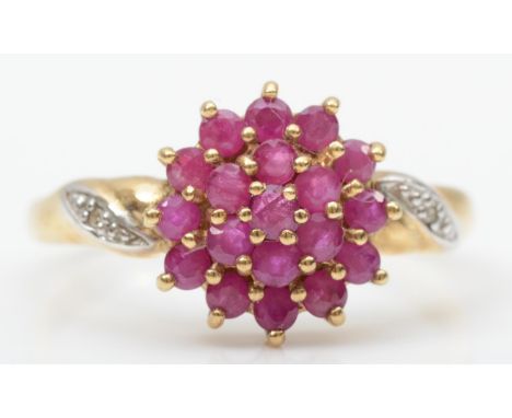 A 9ct gold ruby cluster ring, diamond set shoulders, P, 2.4gm 