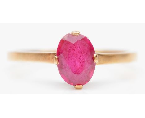 A 14K gold and ruby single stone ring, 8 x 6mm, Q, 2.5gm 