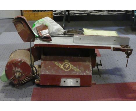 A Coronet bench top saw and sander, with manual 