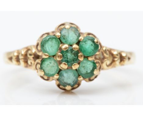 A 9ct gold and emerald cluster ring, M, 1.8gm 