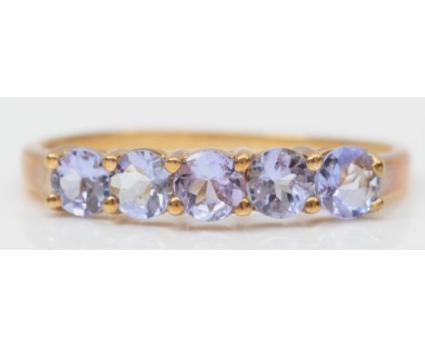 A 9ct gold five stone tanzanite ring, P, 1.6gm 