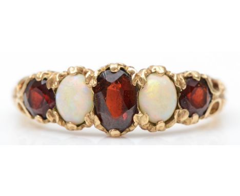 A vintage 9ct gold opal and garnet five stone ring, P, 3.2gm 