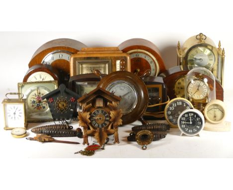 A collection of mechanical and quartz clocks, including a Wallace &amp; Gromit alarm clock, a Smiths desk clock, a Smiths lan