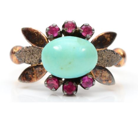 A vintage gold ring, set with a turquoise glass cabochon and synthetic rubies, tests as 9ct gold, M, 4.6gm 