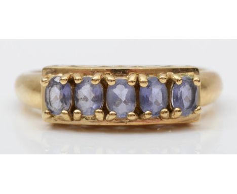 A 9ct gold and five stone tanzanite ring, R, 4gm 