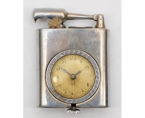 A silver plated combination petrol lighter/watch, spares or repair, lacking striker and watch not working