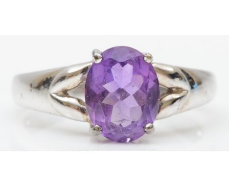 A 9ct white gold amethyst single stone ring, 9 x 7mm, N, 3gm 