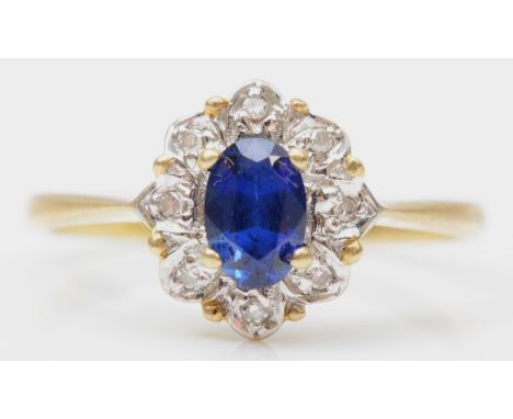 A 9ct gold sapphire and diamond oval cluster ring, N, 2gm 