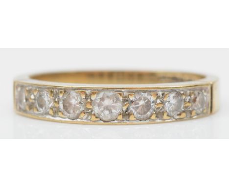 A 9ct gold and seven brilliant cut diamond ring, L, 2gm 