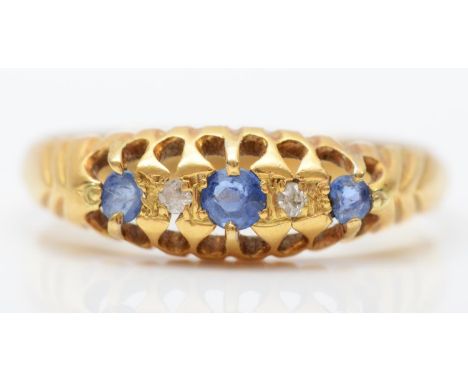 An 18ct gold sapphire and old cut diamond ring, Birmingham 1917, R, 3.1gm 