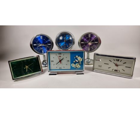 A Chinese Polaris alarm clock with bird amongst foliage, two other Chinese alarm clocks, two Big Ben, Westclox alarm clocks a