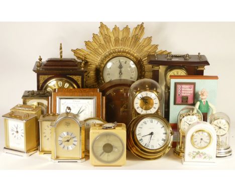 A collection of mechanical and quartz clocks, to include a Sunburst wall clock, anniversary clocks, mantel, alarm and carriag