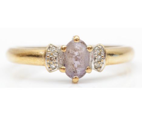 A 9ct gold amethyst and diamond ring, P, 1.8gm 