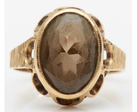 A 9ct gold collet set smokey quartz ring, stone 14 x 10mm, P, 3.8gm 