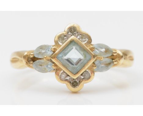 A 9ct gold aquamarine and diamond dress ring, N, 2.4gm 