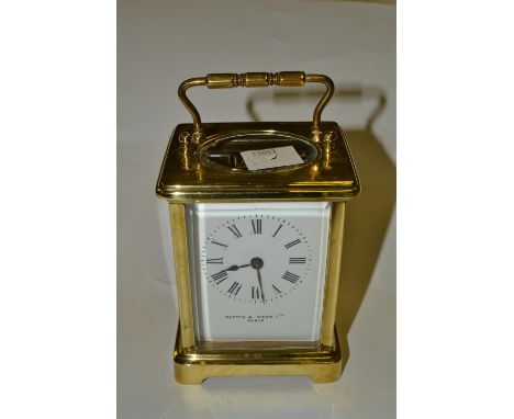 A Mappin and Webb brass carriage clock, French movement, 20th century 