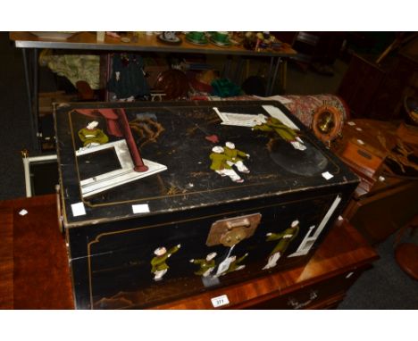 A Japanese black lacquered rectangular trunk, painted with children and attendant, brass handles to sides, 56cm wide, 30cm hi