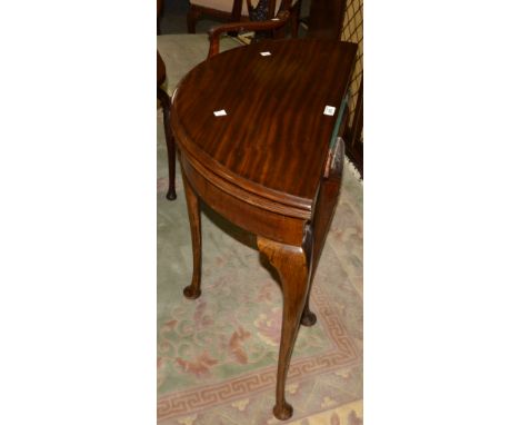 A mahogany demi-lune card table, cabriole legs, c.1920