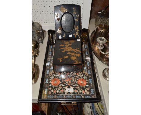 A Japanese shibayama easel frame, 26cm high, Meiji period;  a Japanese lacquered box, in relief in gilt with song bird and fl