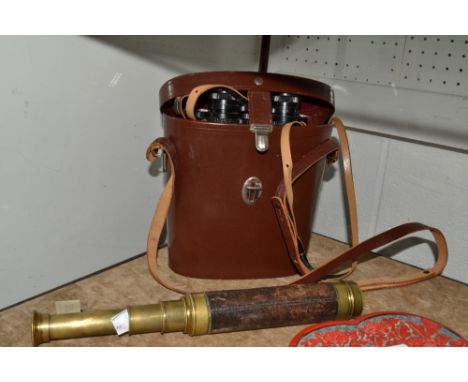 A set of Carl Zeiss binoculars, 10 x 50, cased;  a brass three drawer telescope, late 19th century 
