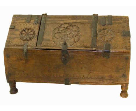 Late 19th century Middle Eastern trinket box with ark top, repaired and decorated with primitive metal strapwork, all standin